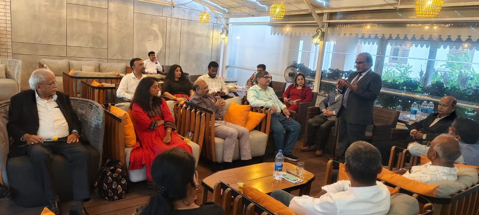 Members listening to a speaker at an evening meet