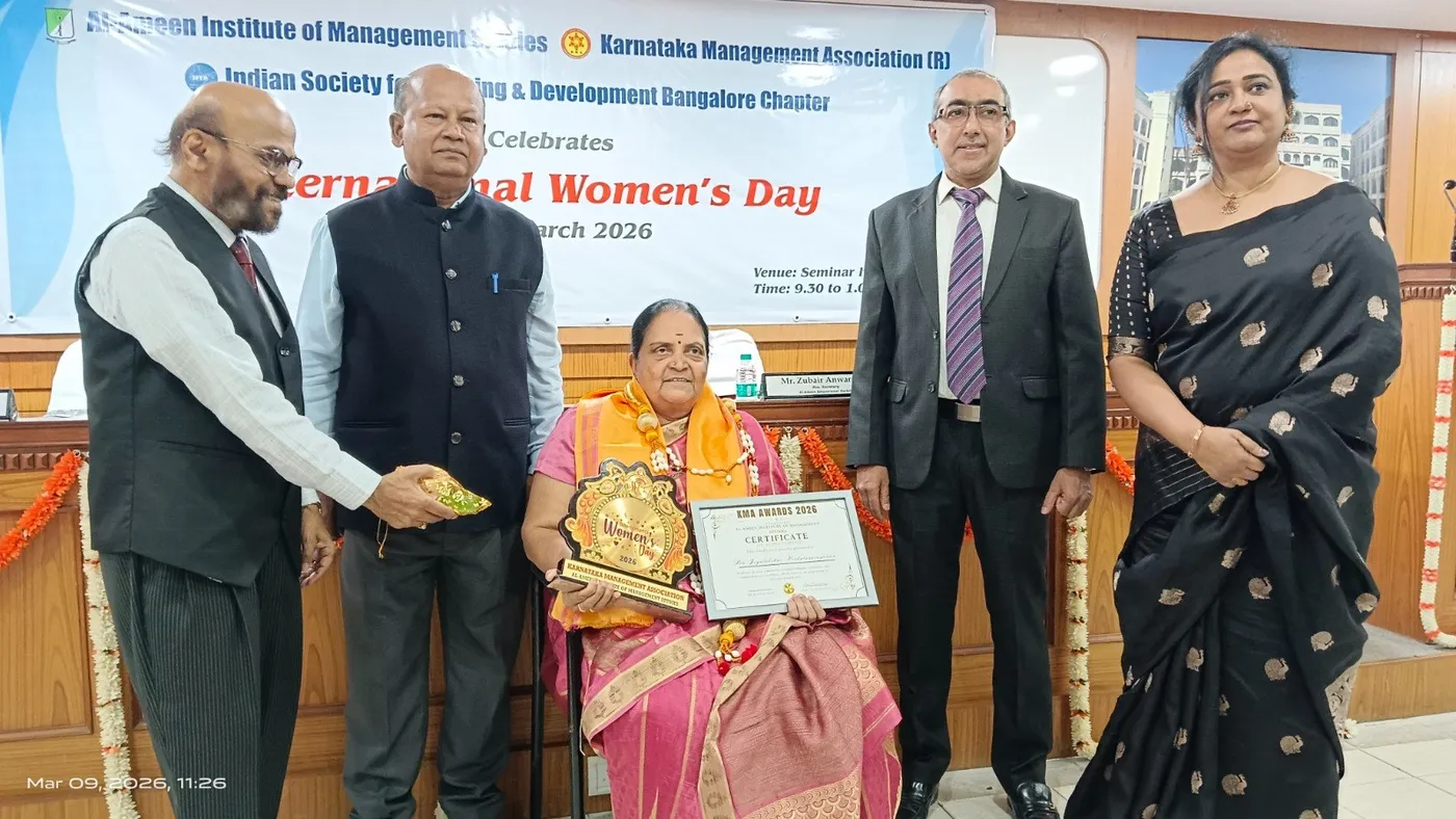An award being presented at an International Women’s Day celebration